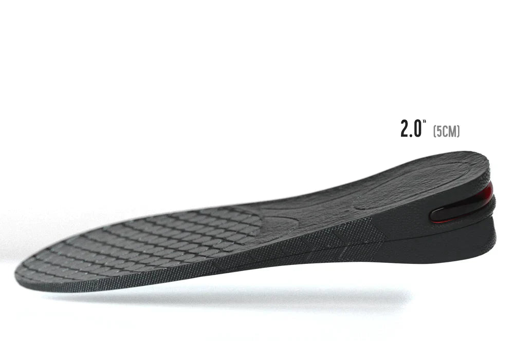 Beckett Sole Booster in black with cushioned design for added height and comfort, displayed on a neutral background.