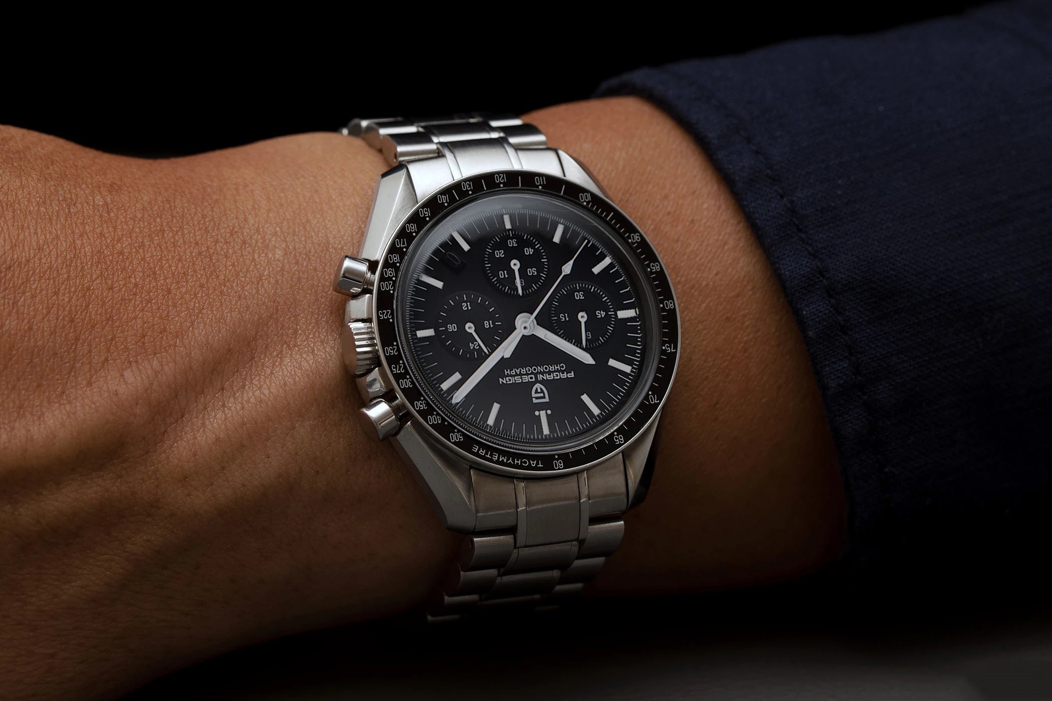 PAGANI DESIGN Moonwatch Chronograph Watch with black dial, stainless steel case, and multiple subdials on a black strap.
