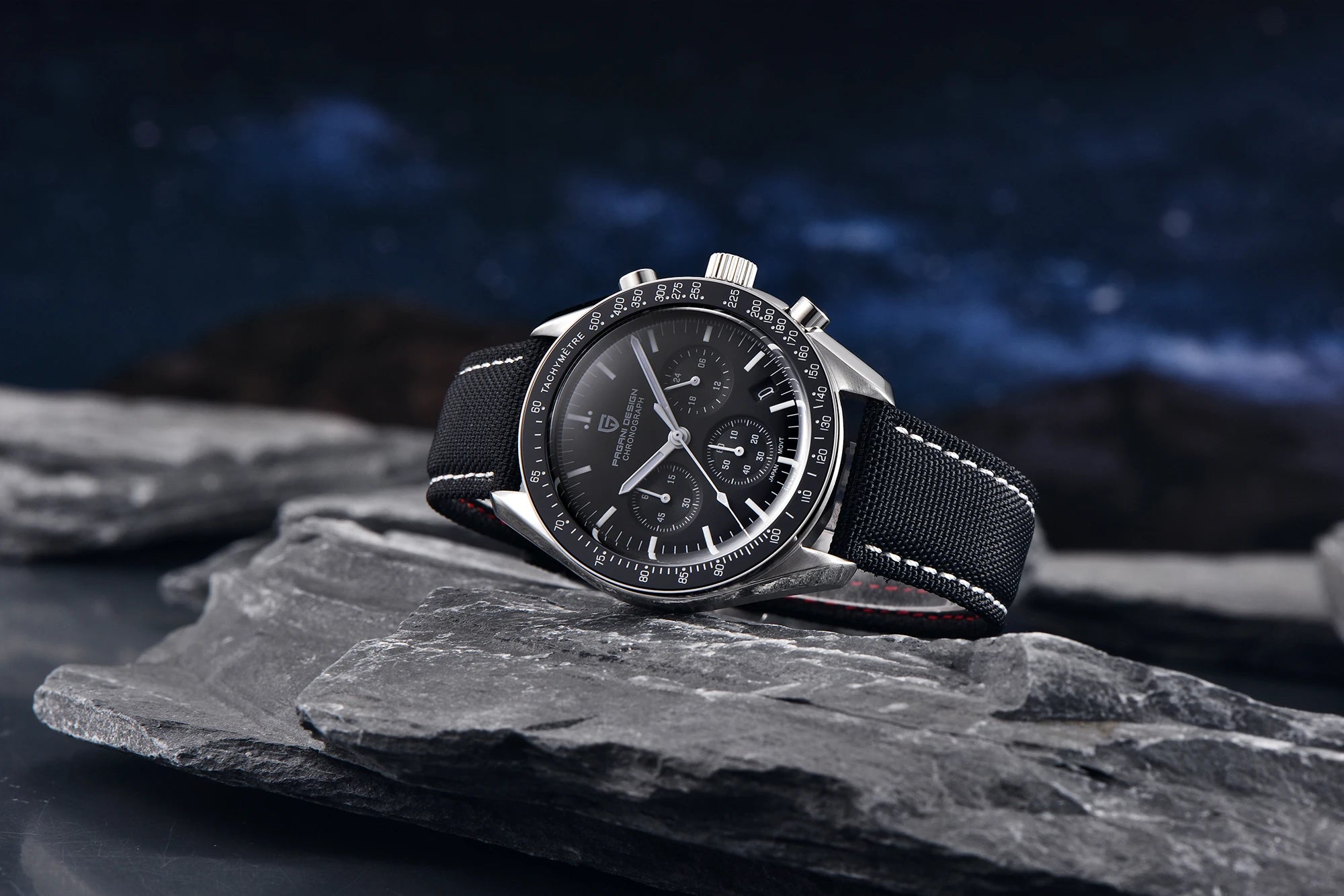 Home Sweet Home PAGANI DESIGN Moonwatch Chronograph Watch with black dial, silver case, and leather strap, close-up view.