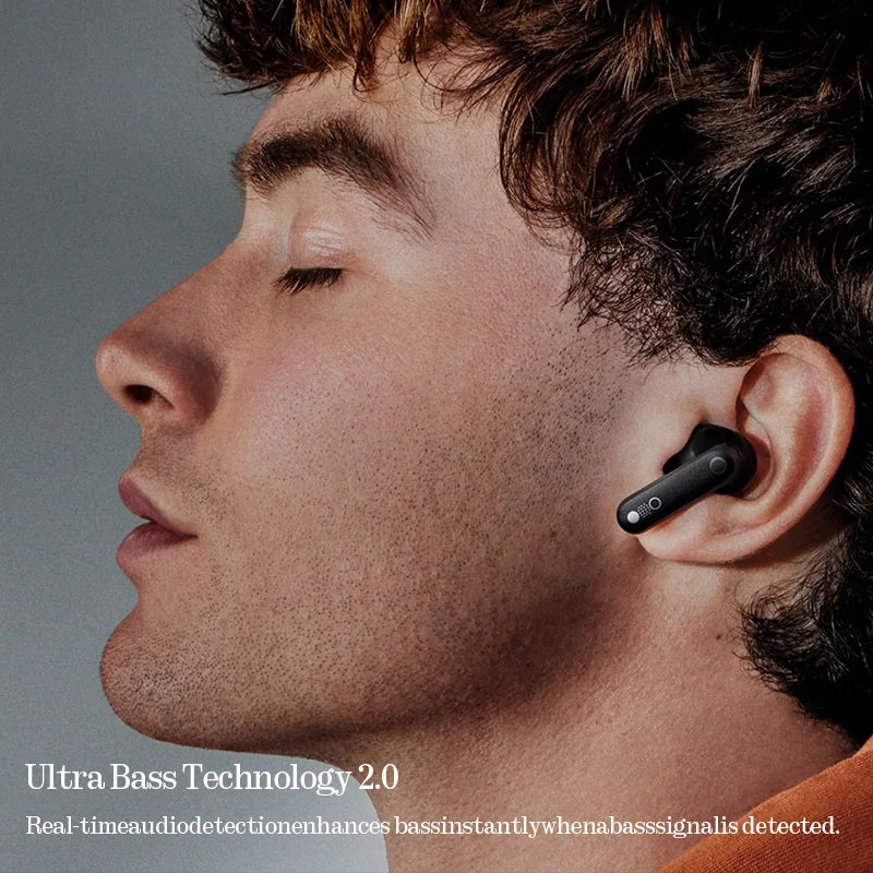 Home Sweet Home CMF Buds 2a wireless earbuds shown in black with charging case and ear tips on a white background.