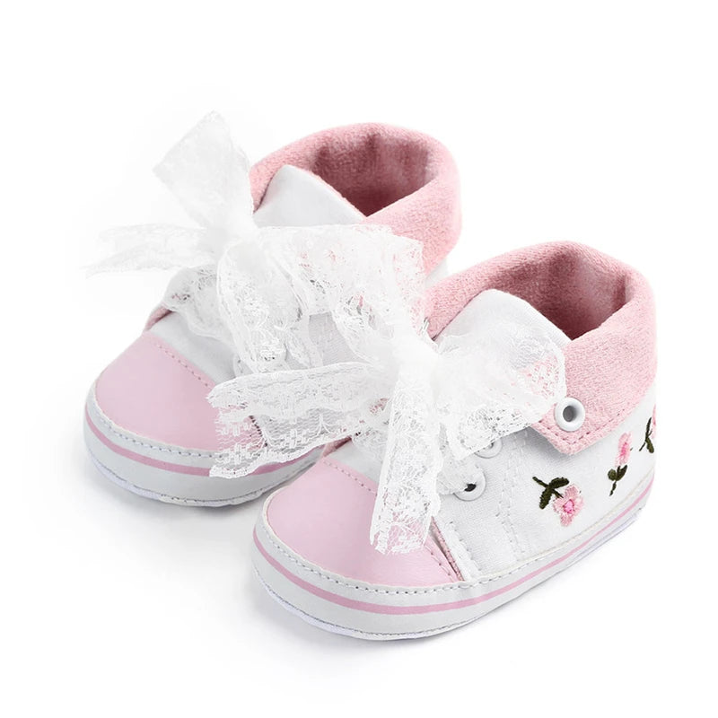 Baby girl floral embroidered soft sole first walker shoes by Home Sweet Home, featuring delicate floral embroidery and soft crib shoe design.