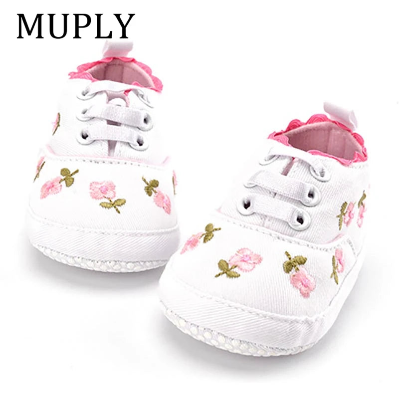 Baby girl floral embroidered soft sole crib shoes by Home Sweet Home, featuring delicate floral embroidery and comfortable first walker design.