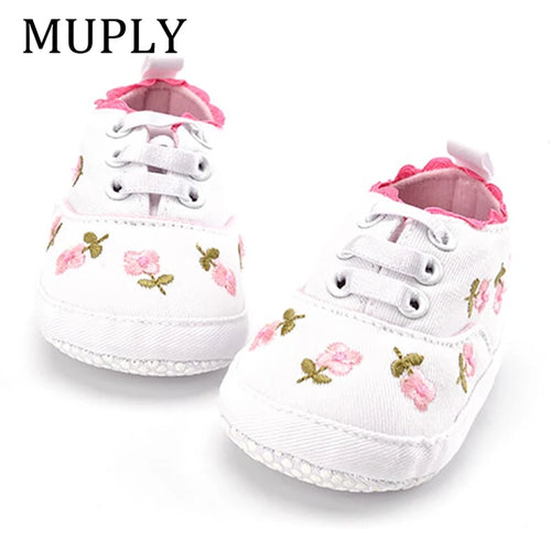 Baby girl floral embroidered soft sole crib shoes by Home Sweet Home, featuring delicate floral embroidery and comfortable first walker design.