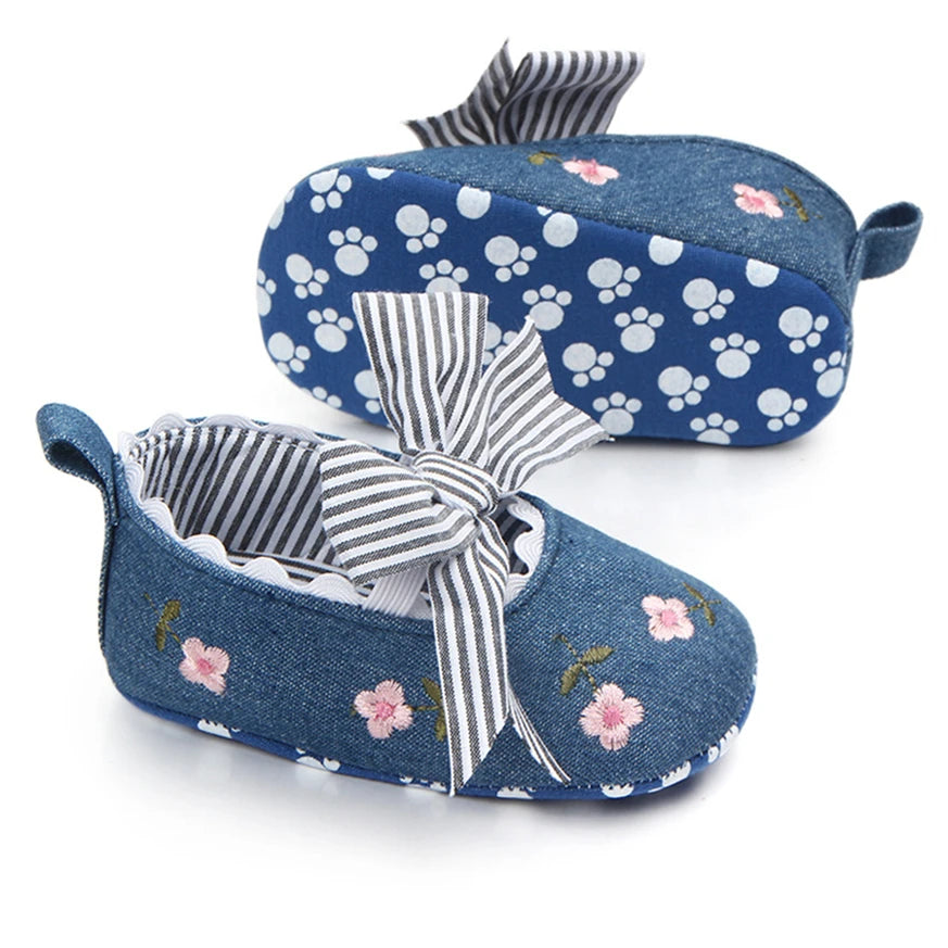 Baby girl floral embroidered first walker shoes by Home Sweet Home, soft sole crib shoes with colorful flower detailing.