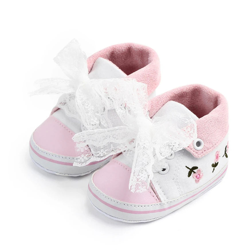 Baby girl floral embroidered first walker shoes with soft soles, crib shoes from Home Sweet Home, featuring delicate floral embroidery.