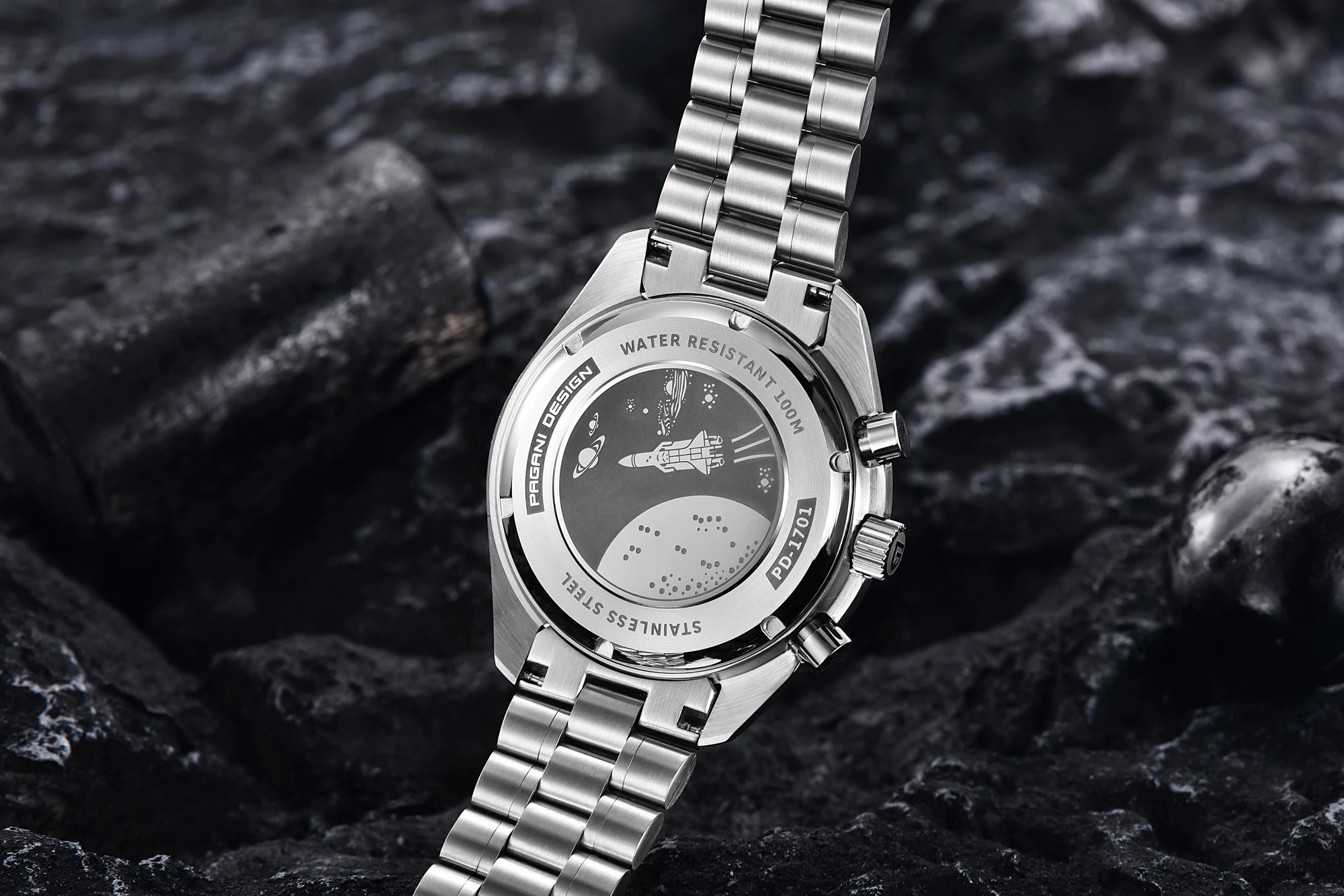 PAGANI DESIGN Moonwatch chronograph watch with black dial, silver case, and stainless steel band, detailed close-up image.