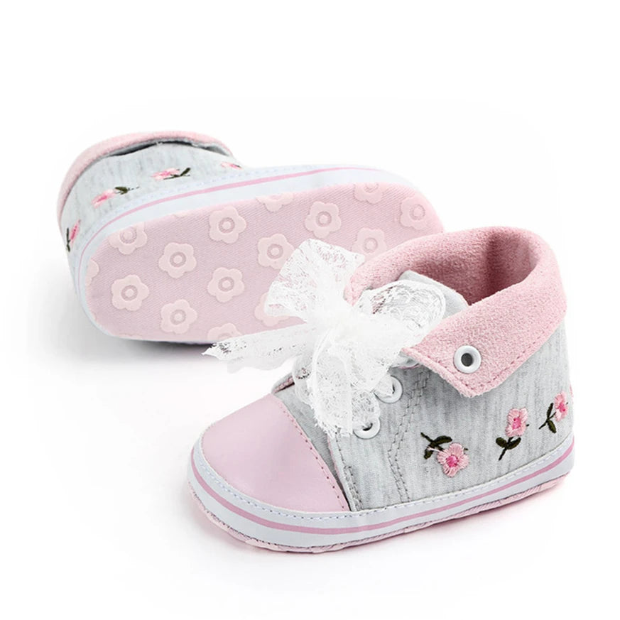 Baby girl floral embroidered first walker shoes by Home Sweet Home, soft sole crib shoes with colorful flower designs.