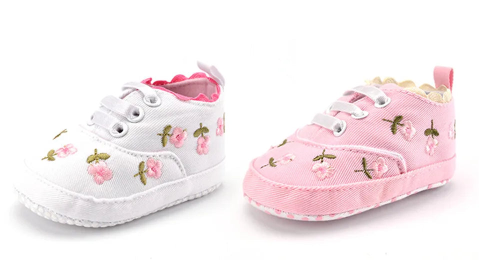 Baby girl floral embroidered first walker shoes with soft soles, designed for comfort and style in crib shoes by Home Sweet Home.