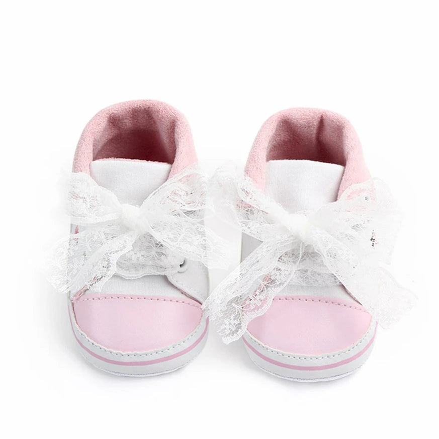 Baby girl floral embroidered soft sole first walker shoes by Home Sweet Home, featuring colorful flower designs and comfortable crib shoe style.