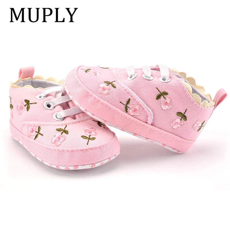 Baby girl floral embroidered first walker shoes by Home Sweet Home, soft sole crib shoes with colorful floral design.