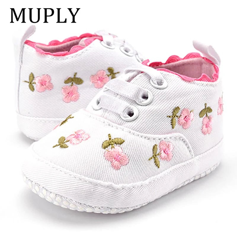 Home Sweet Home baby girl floral embroidered first walker shoes with soft soles, designed for comfortable crib walking.