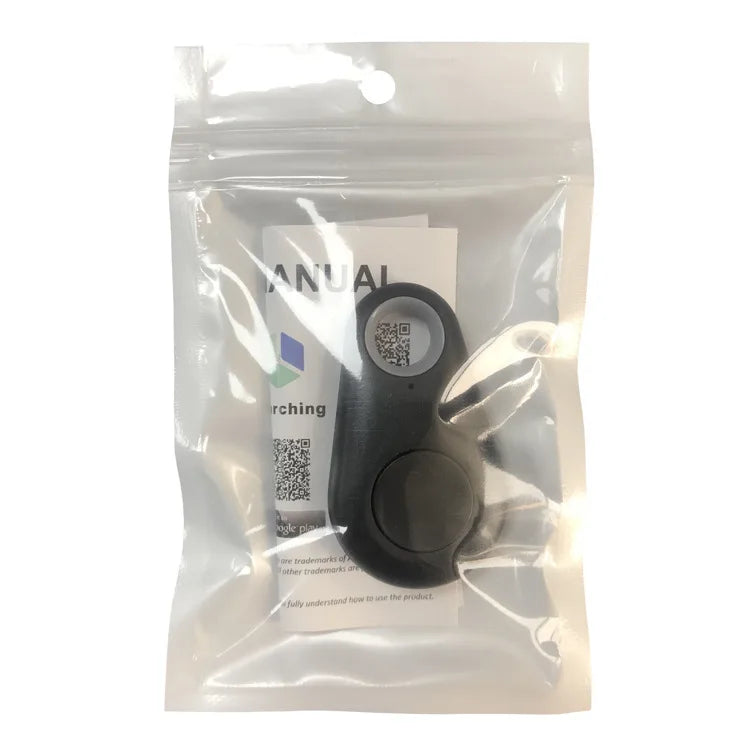 Home Sweet Home Bluetooth key finder and item tracker with compact design and keyring attachment for easy tracking of valuables.