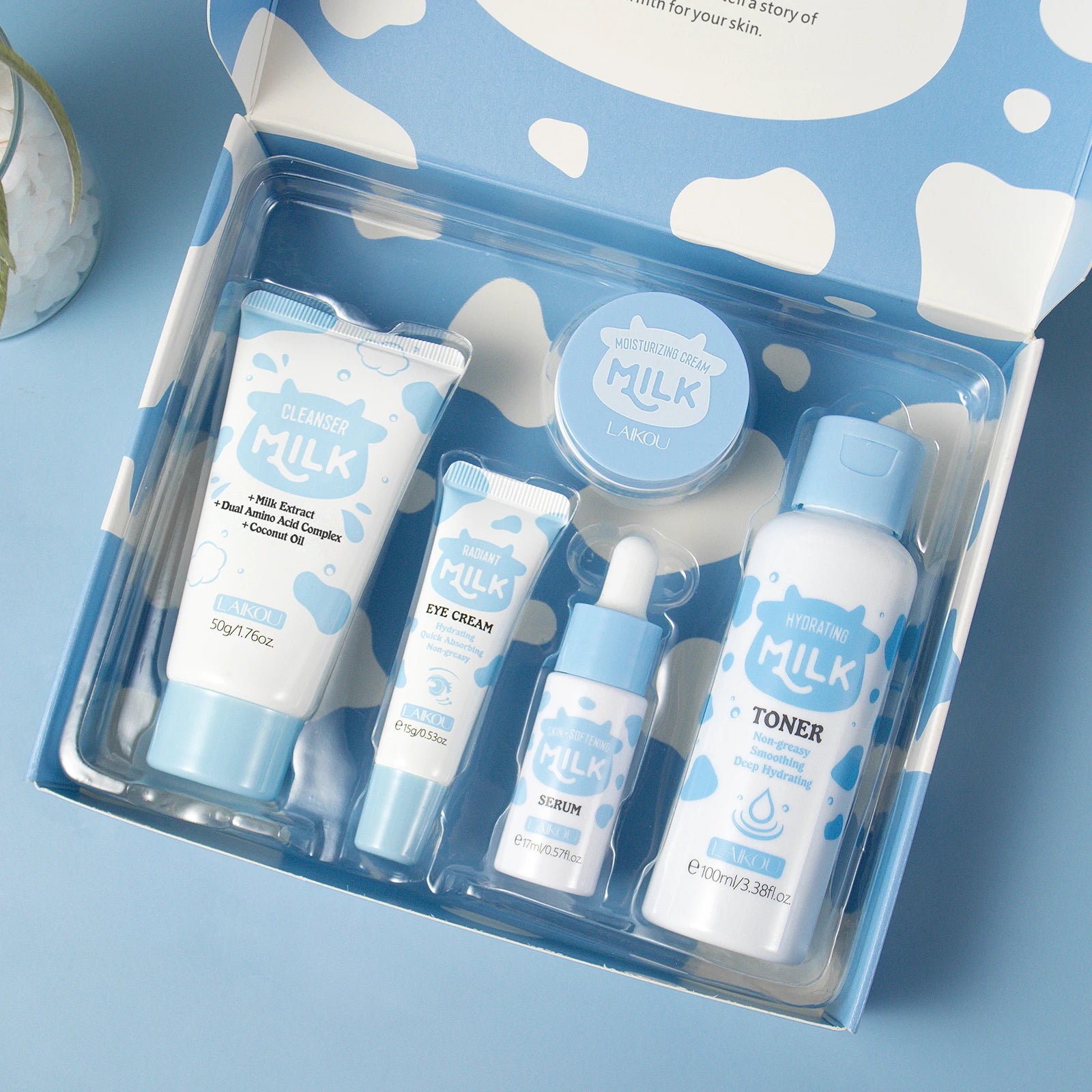 Home Sweet Home Milk Glow Skincare Set with bottles and jars, featuring a gentle skincare collection in soft pastel packaging.