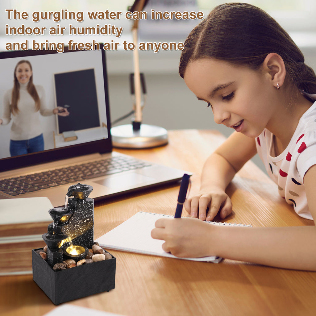 Home Sweet Home tabletop waterfall fountain with soft LED lights, featuring flowing water and a modern desktop water feature design.