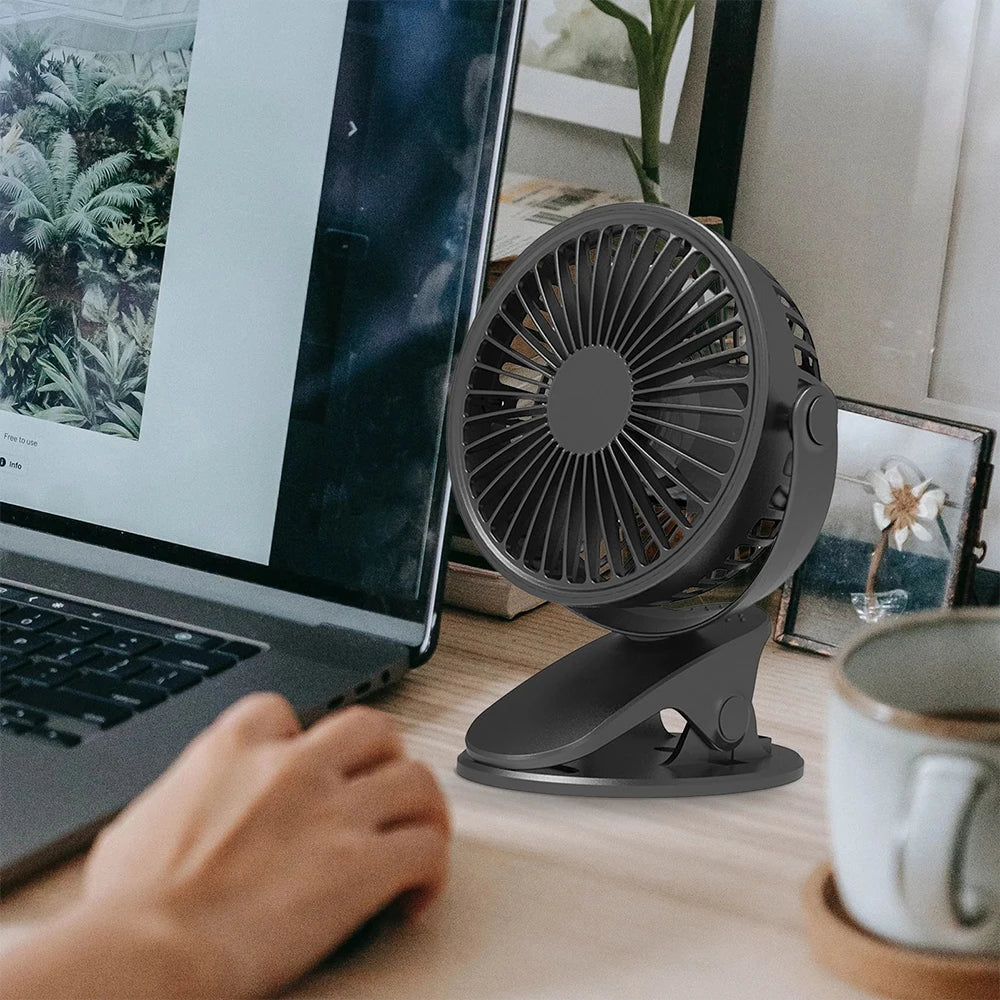Portable clip-on mini fan from Home Sweet Home with adjustable blades and compact design for personal cooling.