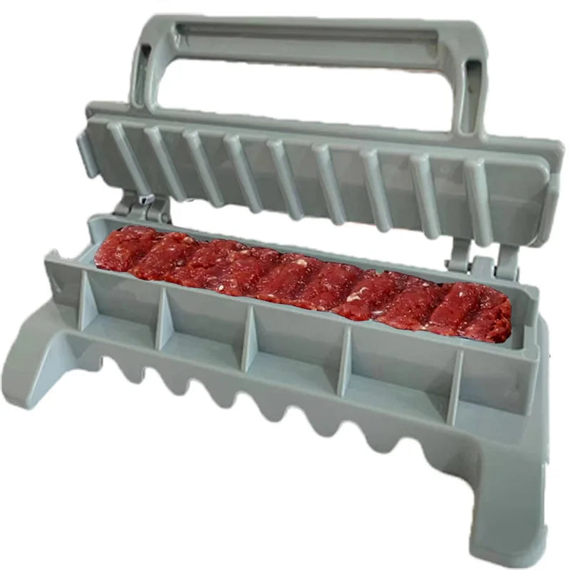 Home Sweet Home BBQ kebab skewer maker, reusable meat skewer press machine with ergonomic handle for easy kebab assembly.