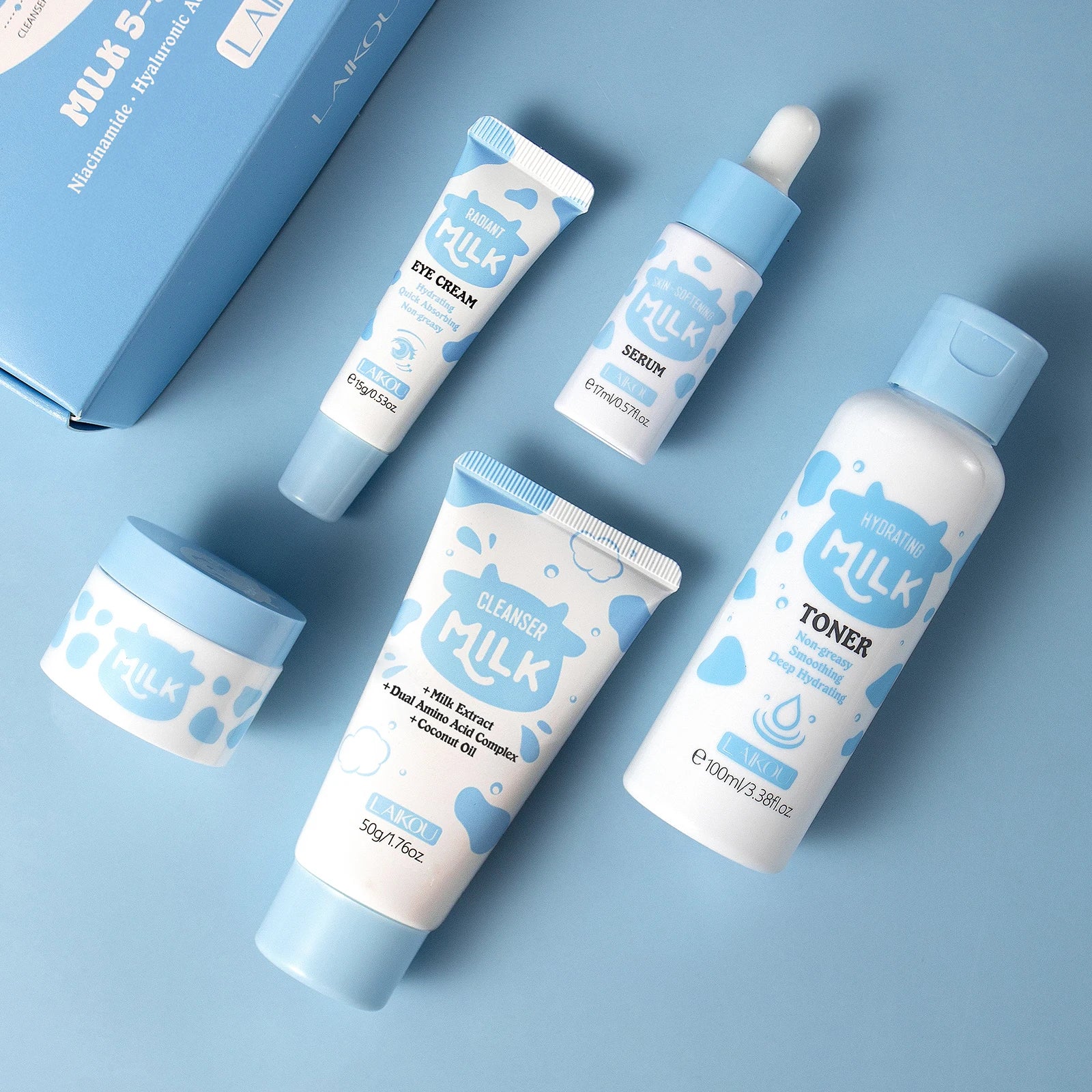 Home Sweet Home Milk Glow Skincare Set with cleanser, moisturizer, and serum featuring sleek bottles and soft pastel packaging.