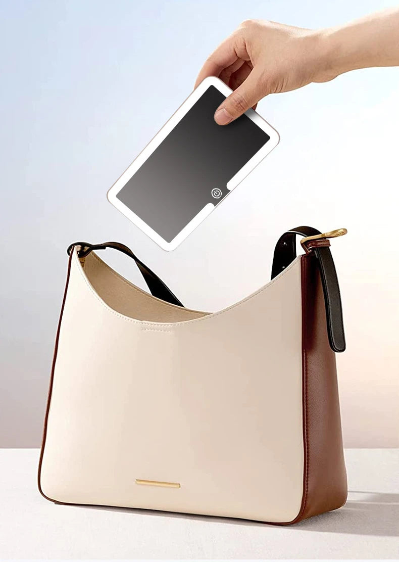 Home Sweet Home LED rechargeable car sun visor vanity mirror with built-in lighting for convenient makeup application.