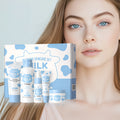 Home Sweet Home Milk Glow Skincare Set with bottles of moisturizer, cleanser, and serum arranged on a clean, bright background.