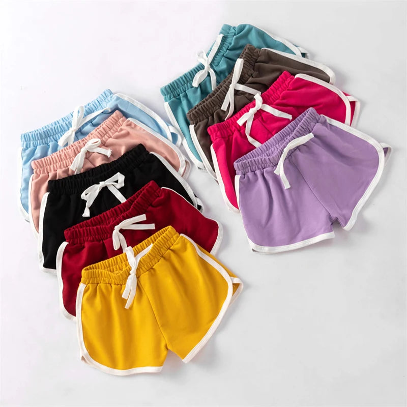 Kids Candy Colour Summer Shorts by Home Sweet Home, casual cotton shorts in vibrant candy colors for girls and boys aged 3-18.