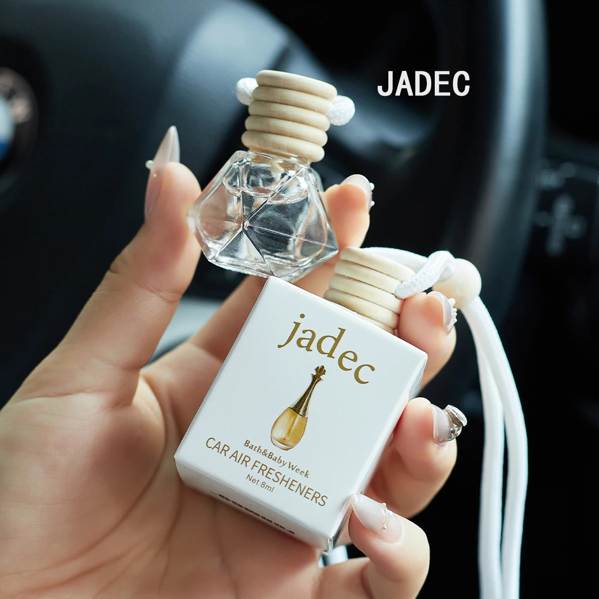 Home Sweet Home car air freshener perfume in a sleek bottle, designed to provide a fresh, pleasant scent inside vehicles.