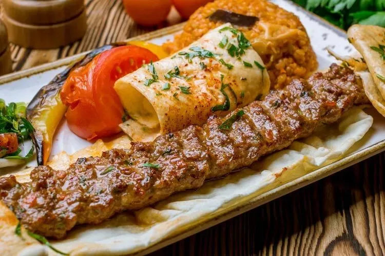 Home Sweet Home BBQ kebab skewer maker, reusable meat skewer press machine with ergonomic handle for easy kebab assembly.