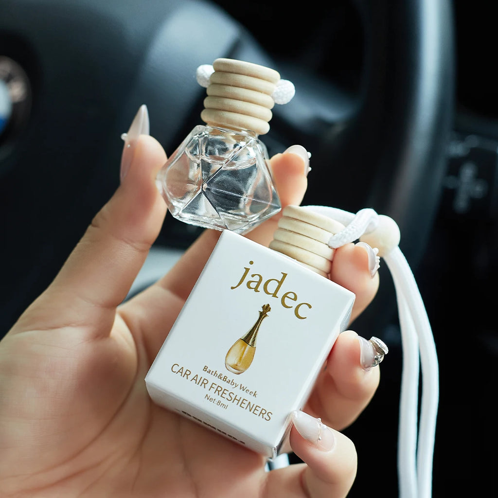 Home Sweet Home car air freshener perfume hanging with floral design and fresh scent in a sleek bottle