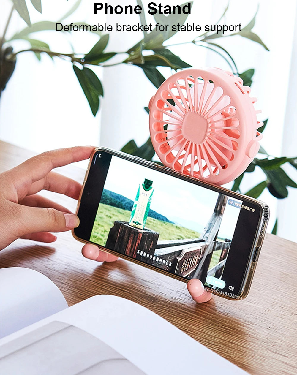 Home Sweet Home portable mini clip fan with USB rechargeable design and 360° flexible tripod for versatile cooling.