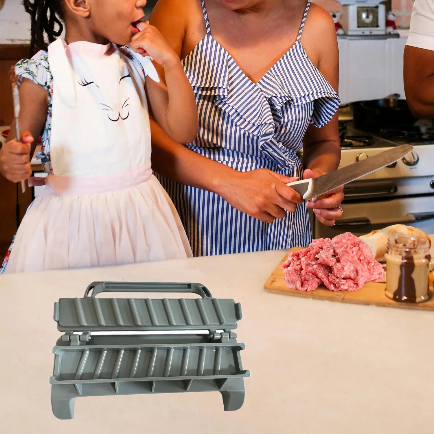 Home Sweet Home BBQ kebab skewer maker, reusable meat skewer press machine with stainless steel prongs for easy kebab preparation.
