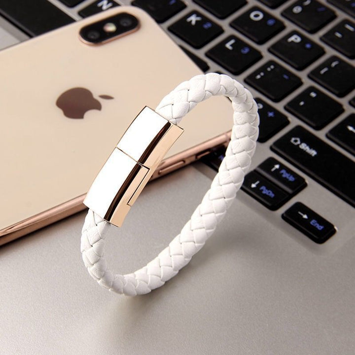 Beckett charging bracelet with sleek black design and embedded charging port, stylish wearable tech accessory for on-the-go charging.