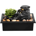 Home Sweet Home tabletop waterfall fountain with gentle LED lights, featuring flowing water and a decorative stone design.