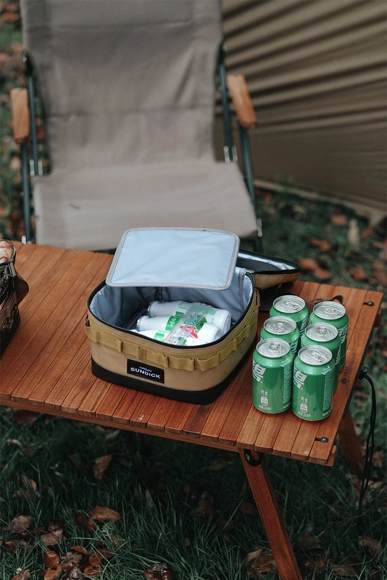 Large insulated picnic cooler bag by Home Sweet Home, showing a spacious, black cooler bag with a top handle and zipper closure.