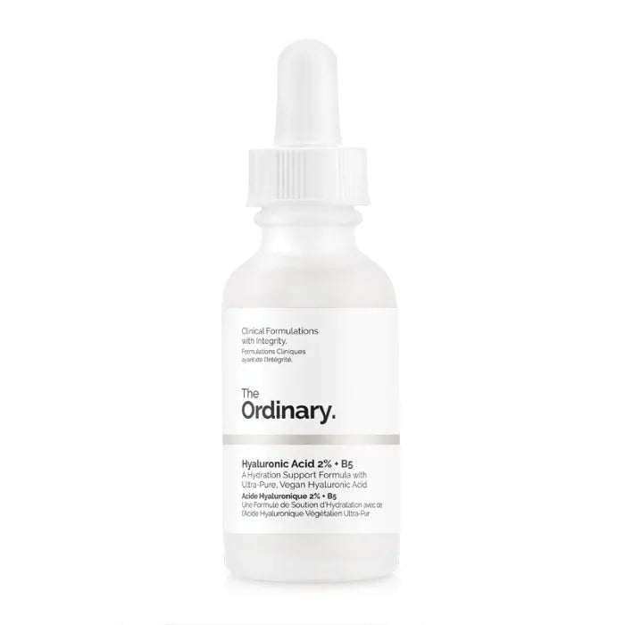 Home Sweet Home Niacinamide and Hyaluronic Acid Serum bottle shown with dropper and moisturizing effects on clear skin.