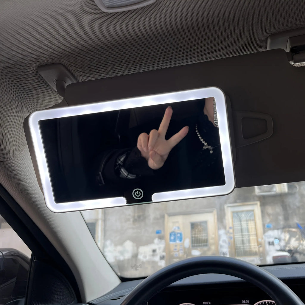 LED rechargeable car sun visor vanity mirror with built-in lighting, compact design, and easy attachment for convenient grooming on the go.