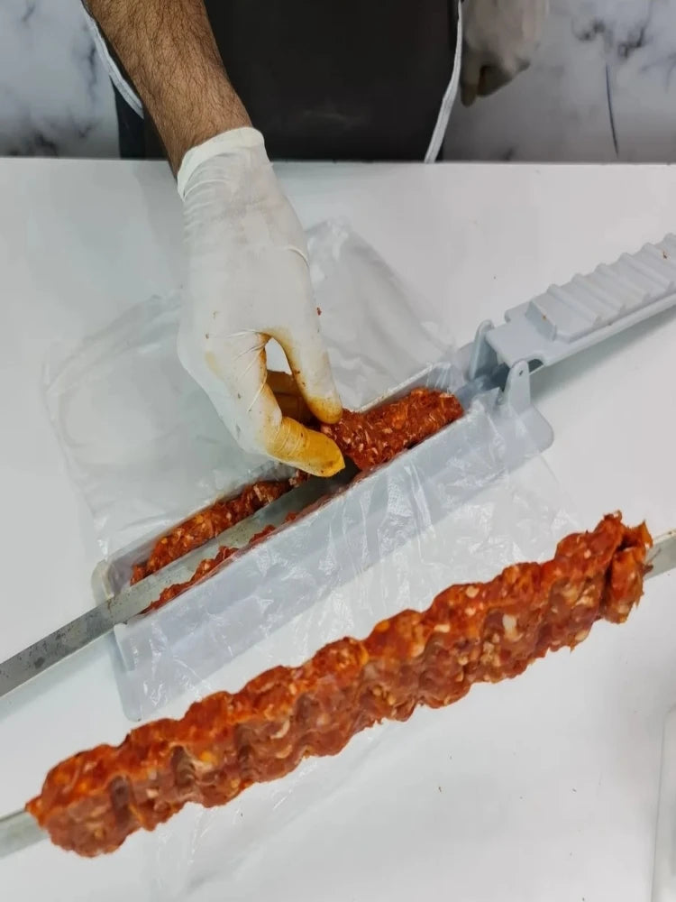 Reusable BBQ kebab skewer maker from Home Sweet Home, compact meat skewer press machine for easy kebab preparation.