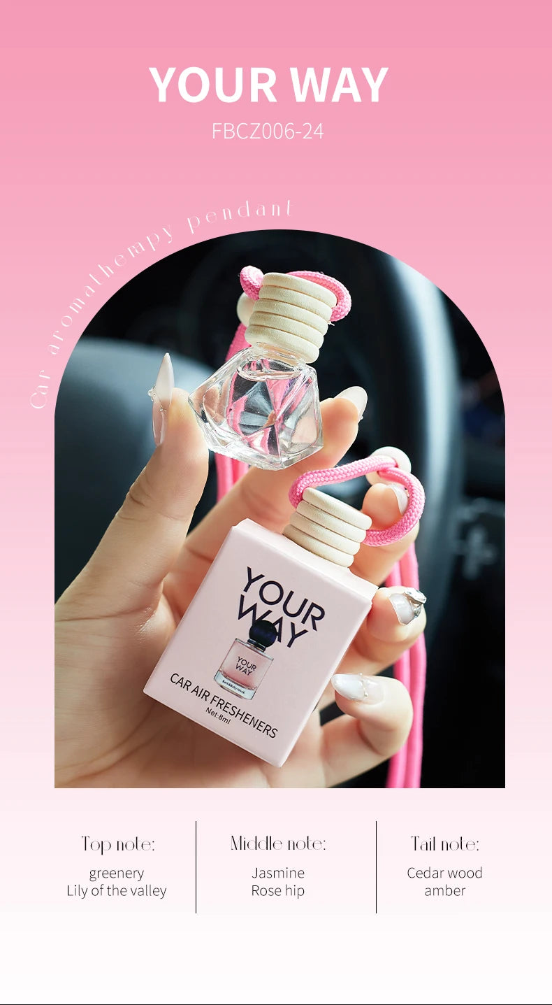 Home Sweet Home car air freshener perfume hanging in a vehicle, providing a fresh and pleasant scent.