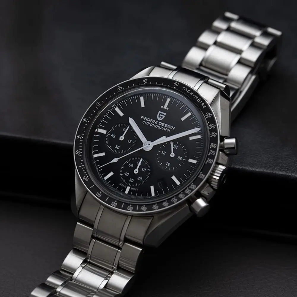 Home Sweet Home PAGANI DESIGN Moonwatch Chronograph watch with black dial and stainless steel band on a wrist.