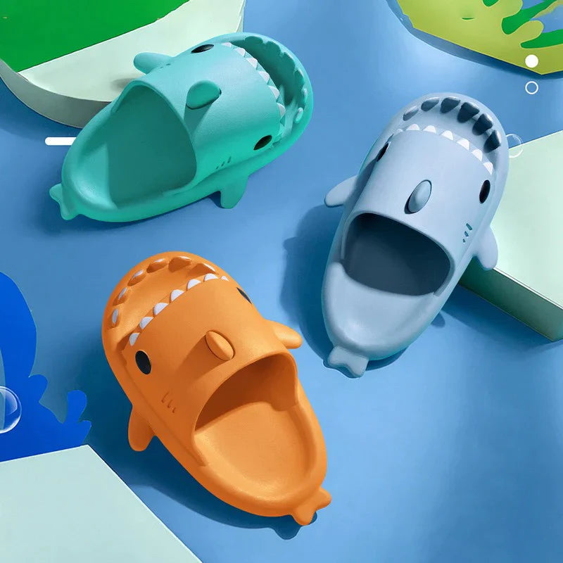Beckett Shark Slides featuring black straps and shark logo, casual slip-on footwear for comfortable everyday wear
