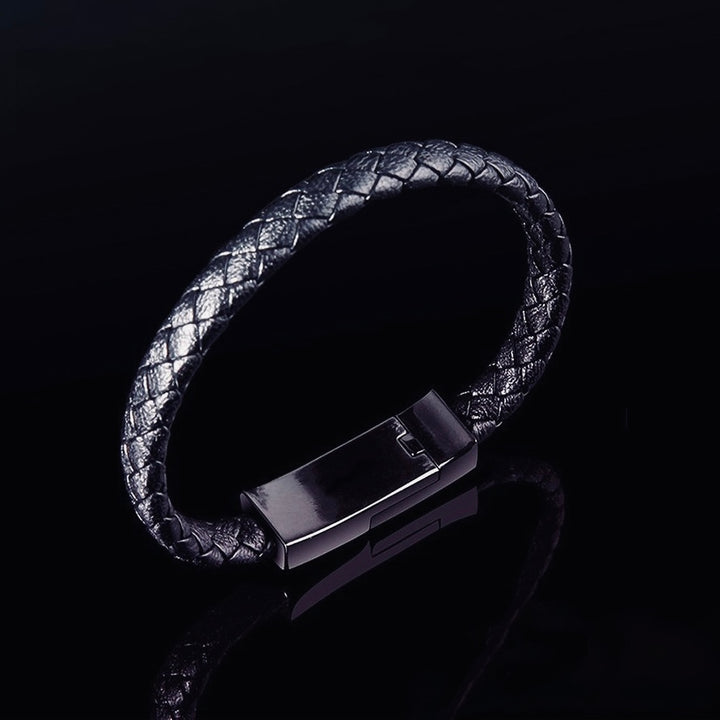 Beckett charging bracelet with sleek black design and integrated charging port, stylish wearable tech accessory.
