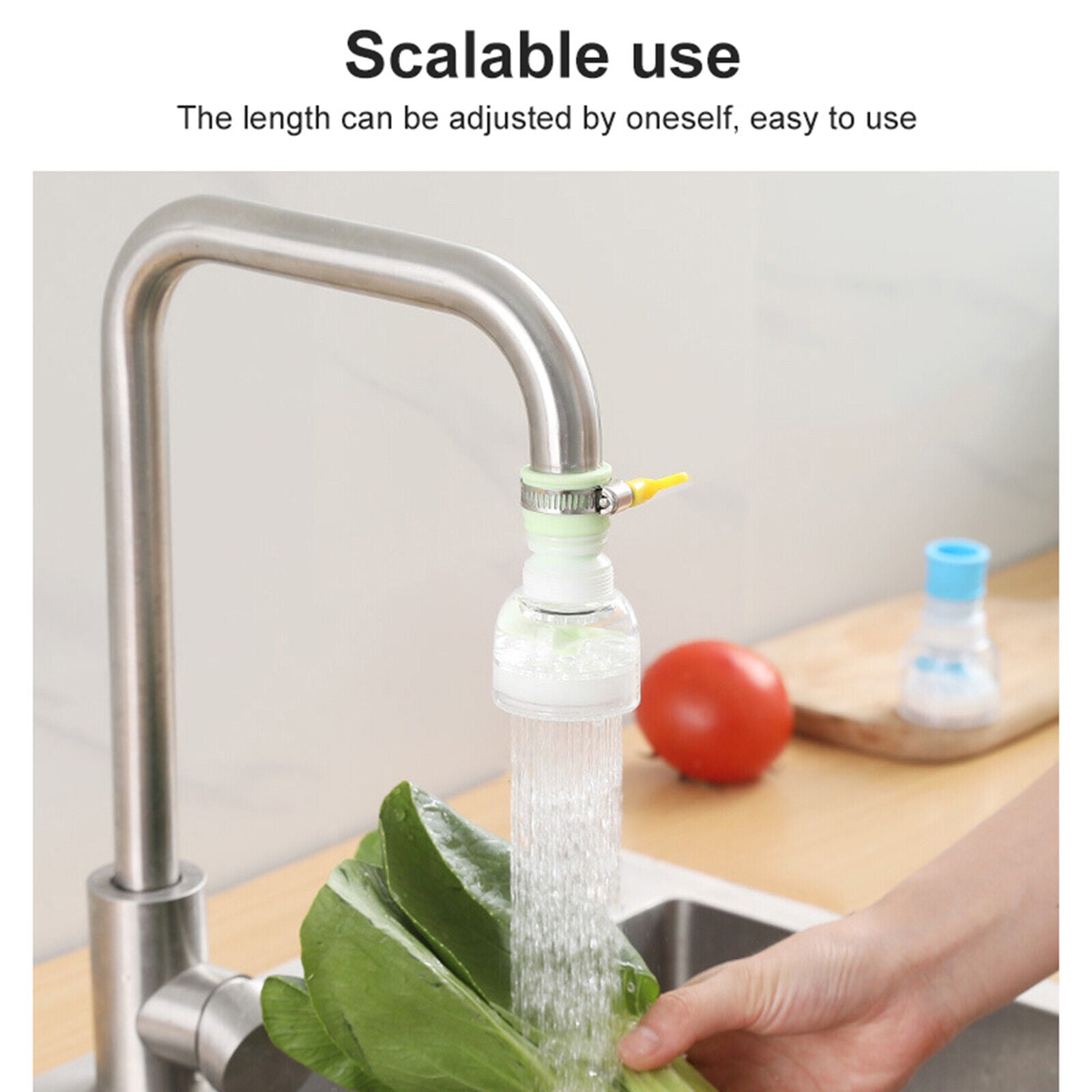 Ignisio 360-rotation kitchen sink faucet extender attached to a modern chrome faucet for flexible water flow.