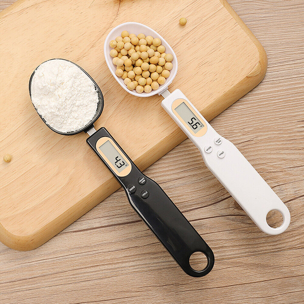 Beckett LCD digital kitchen scale with spoon, featuring a sleek design and digital display for precise food measurement.
